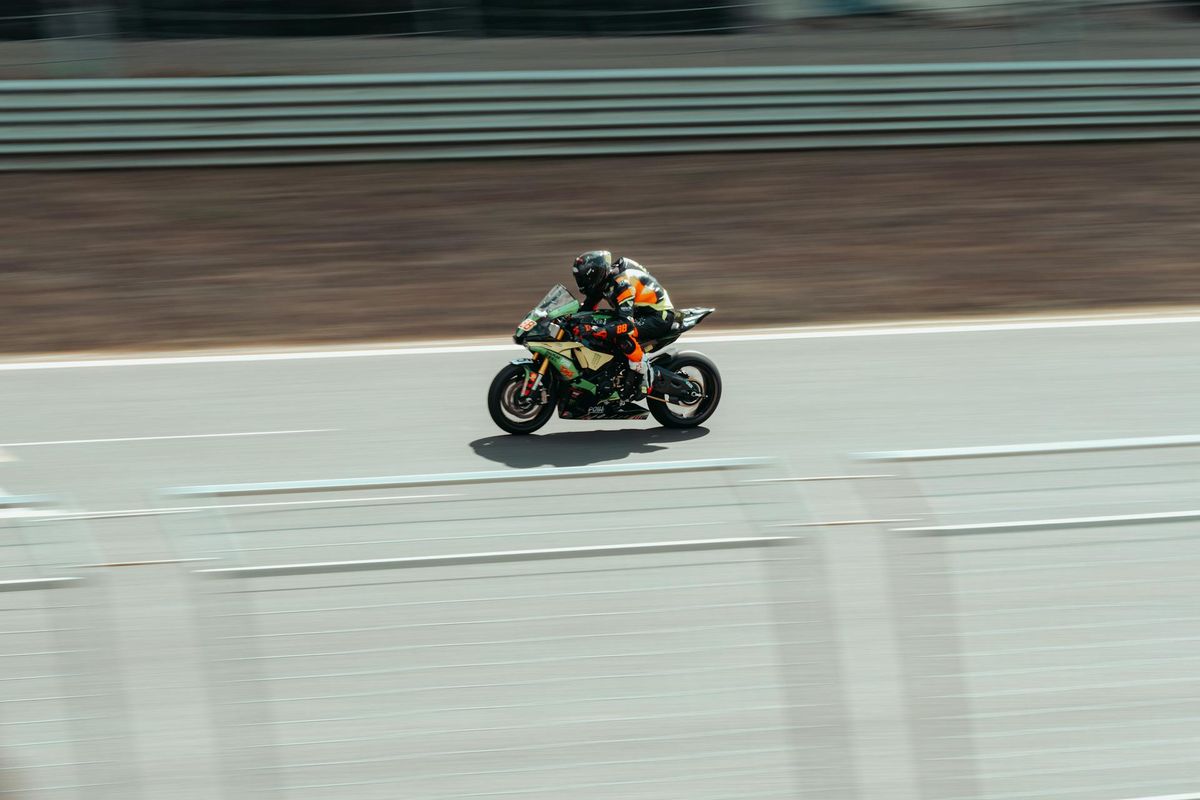 Motorcyclist racing on a track